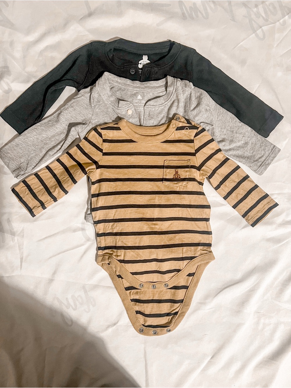 Set of Three Baby Gap Long Sleeve One-Piece Bodysuits Black, Gray, Tan Stripe